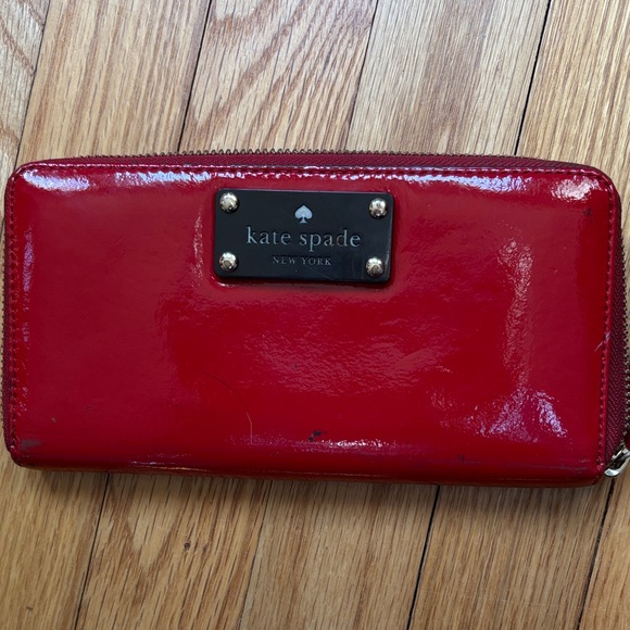 kate spade Handbags - Kate Spade Glossy Red Zip Wallet